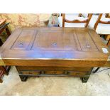 Oak coffee table with brass corners and three copper lined compartments.