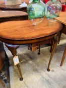 Mahogany kidney shaped occasional table.