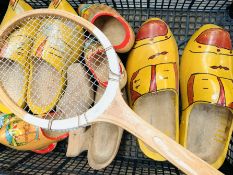 5 pairs of wooden clogs, and a wooden tennis racquet.