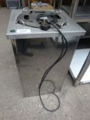Heated plate lowerator