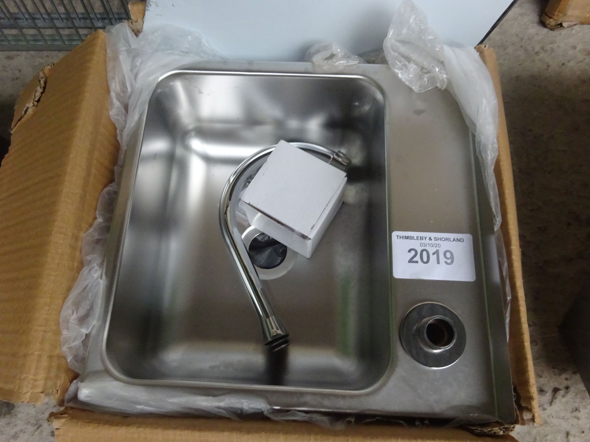 New stainless steel hand sink with taps