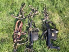 4 leather headcollars and 2 heavy horse bridles