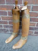 Pair of wooden boot trees, length of sole 10.5 inches, height 18.5 inches