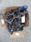 Box of assorted items such as 2 x snaffle bits etc