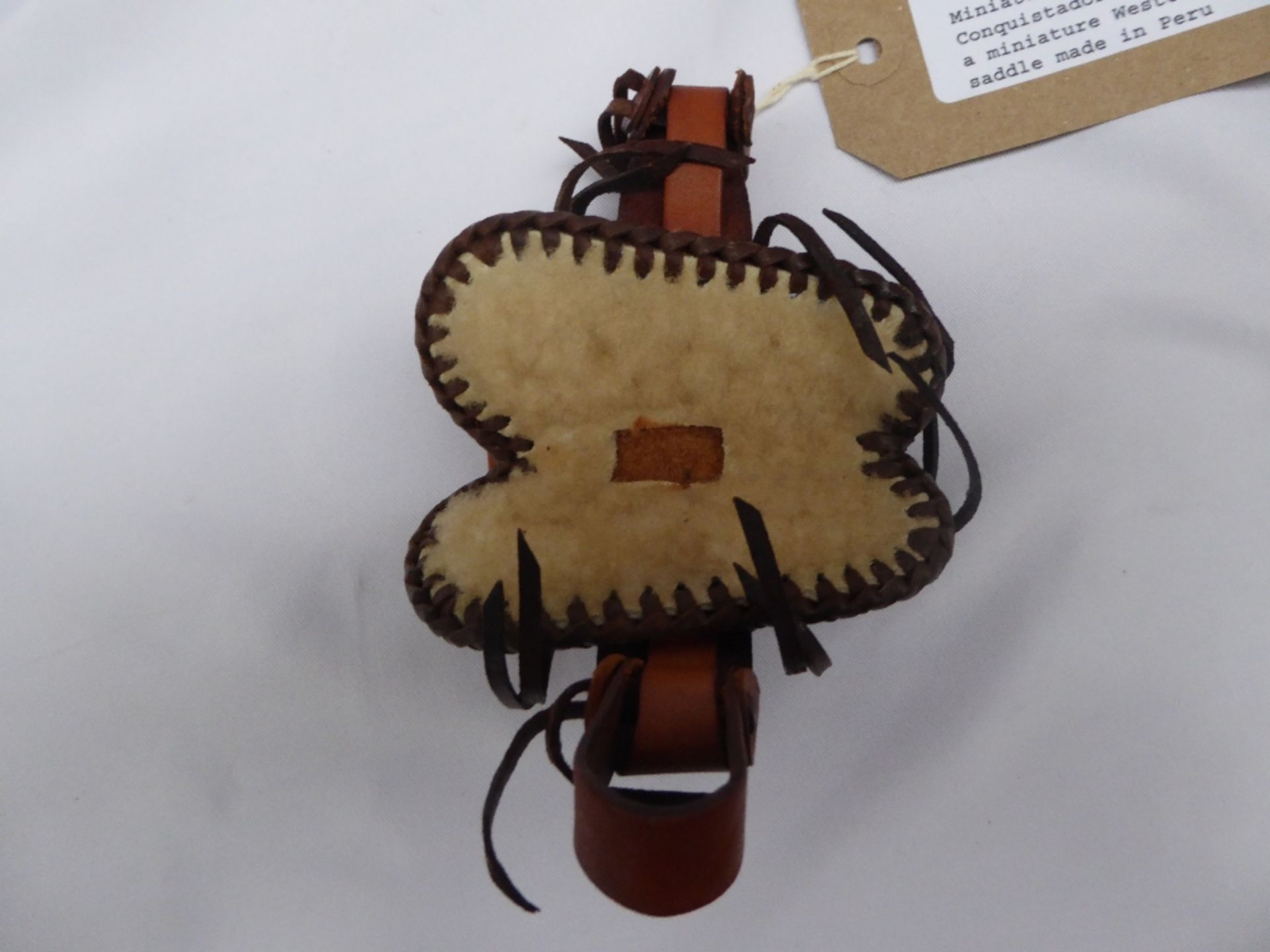 Miniature Spanish Conquistador saddle and a miniature Western saddle made in Peru - Image 12 of 12