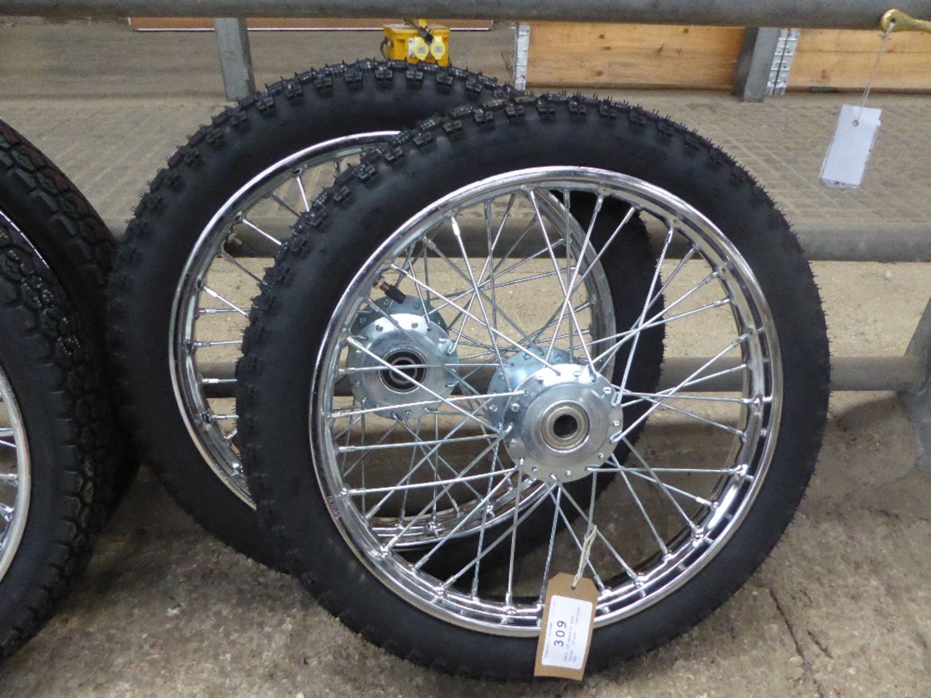 Pair of wire wheels and tyres, 16ins - carries VAT