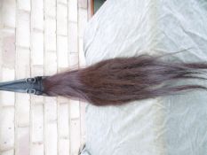 Black leather crupper with full horsehair tail