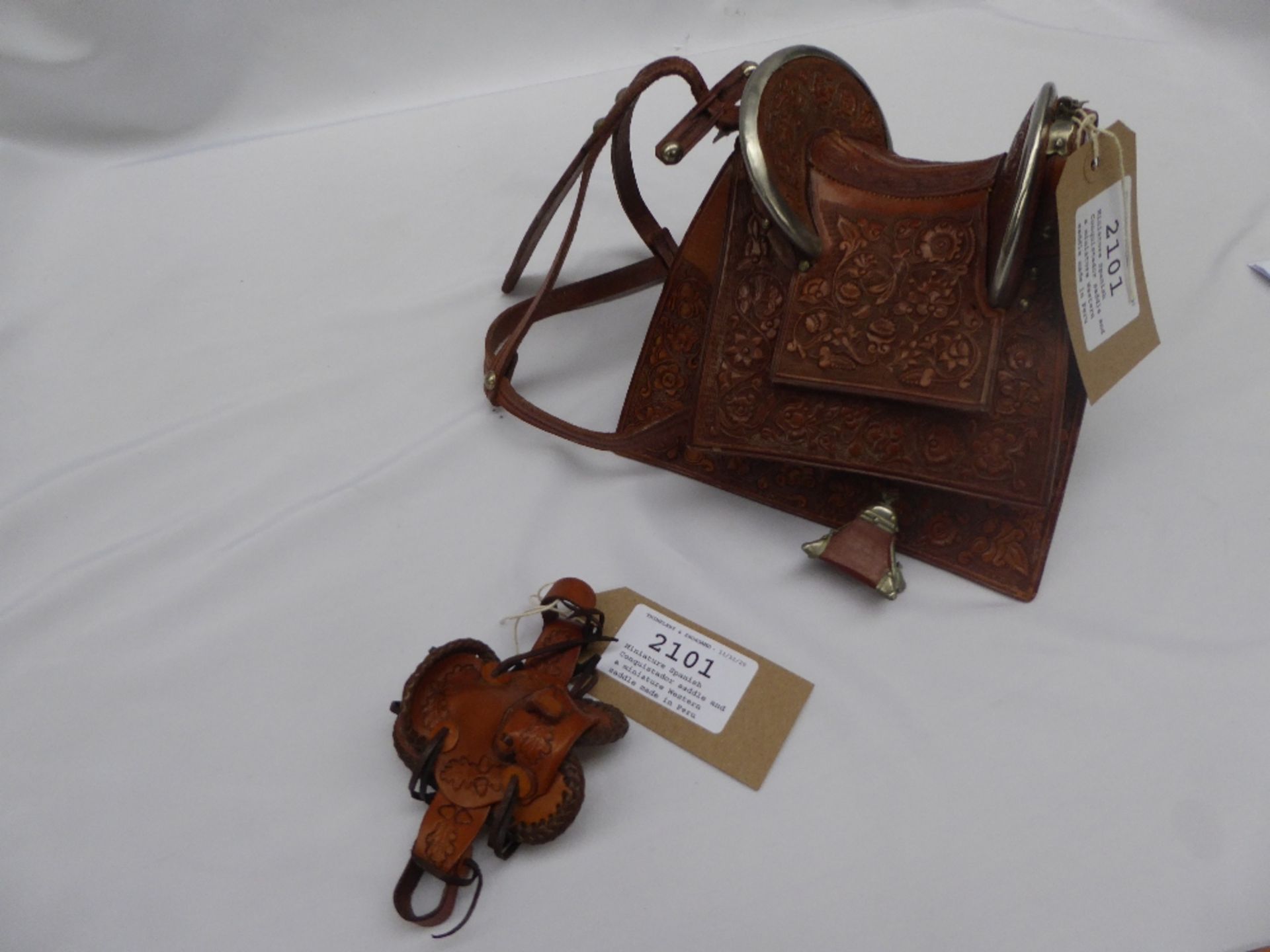 Miniature Spanish Conquistador saddle and a miniature Western saddle made in Peru - Image 11 of 12