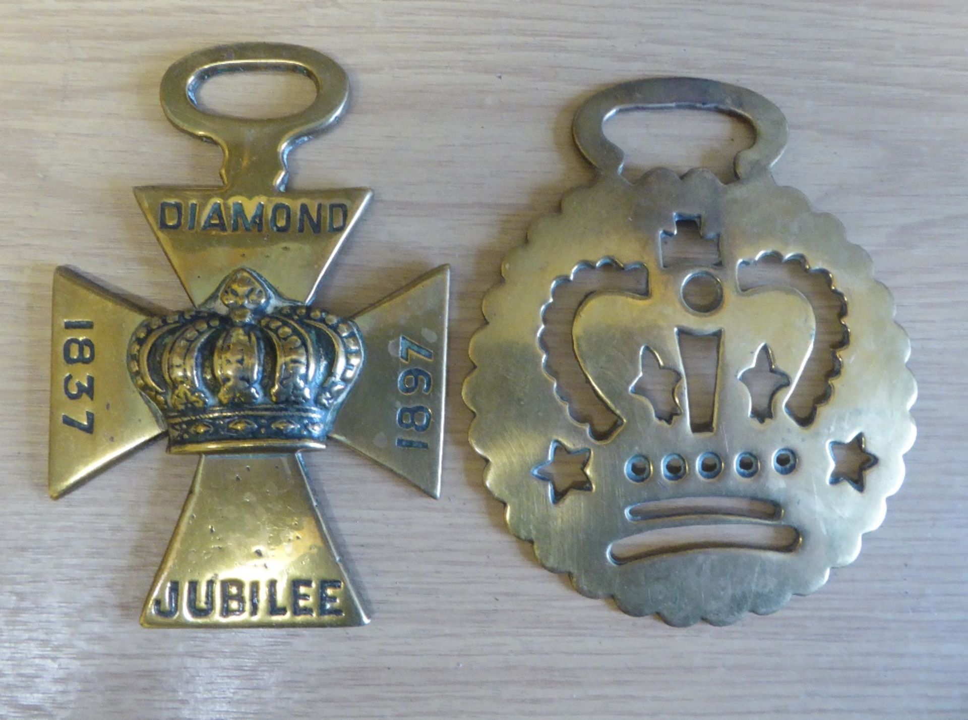 A Maltese Cross commemorative royalty brass - Diamond Jubilee 1837-1897; and another brass