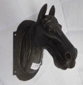 Cast iron wall hanging of horse's head