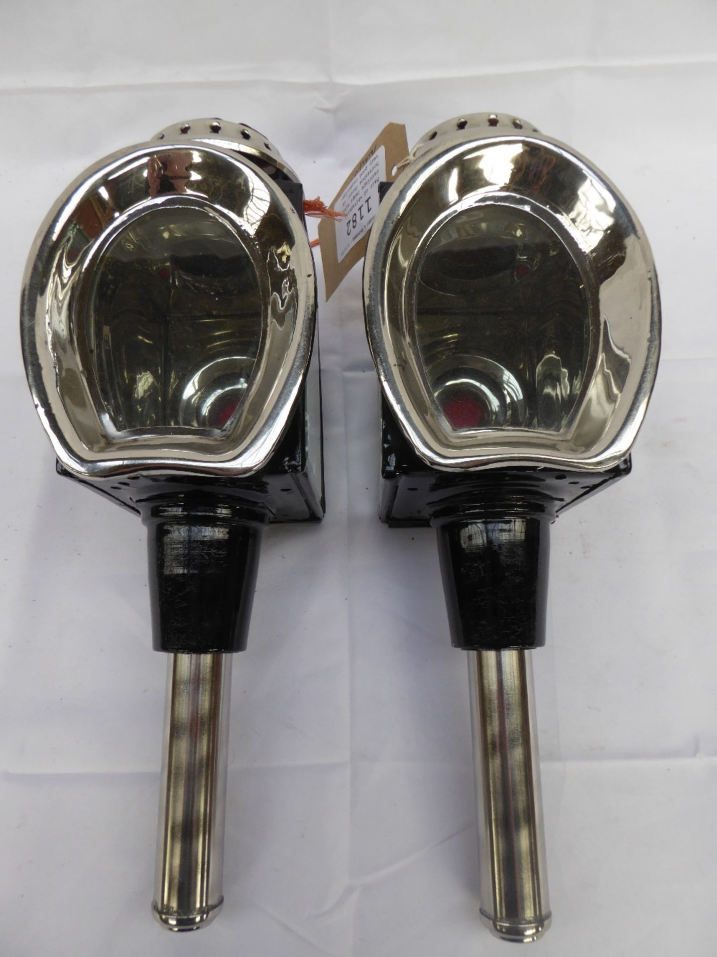 Pair of whitemetal carriage lamps with horseshoe front;
