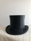 Silk top hat by Scott's of London with original hat box, size 7 1/8