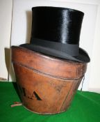 Silk top hat by Henry Heath size 7 1/4, with a leather hat box,