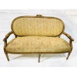 Regency gilt carved framed salon sofa.
