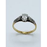 18ct gold, platinum and diamond engagement ring, size L 1/2 to M, central diamond about .25ct