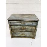 Painted antique pine chest of three graduated drawers.