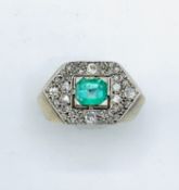 Hexagonal diamond and emerald platinum ring. Size N 1/2 Wt 9.7gms Centre emerald 6.4mm x 5.7mm. E