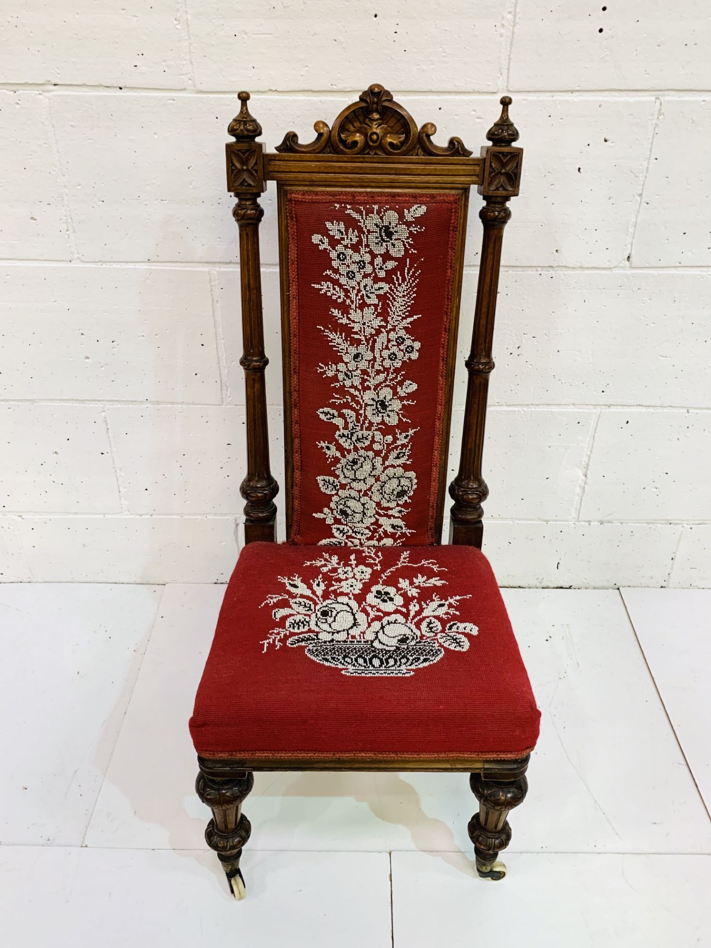 Carved mahogany framed high back hall chair with bead embroidered seat and back on ceramic casters. - Image 2 of 4