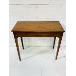 Mahogany small table with shell inlaid, frieze drawer on tapered legs.