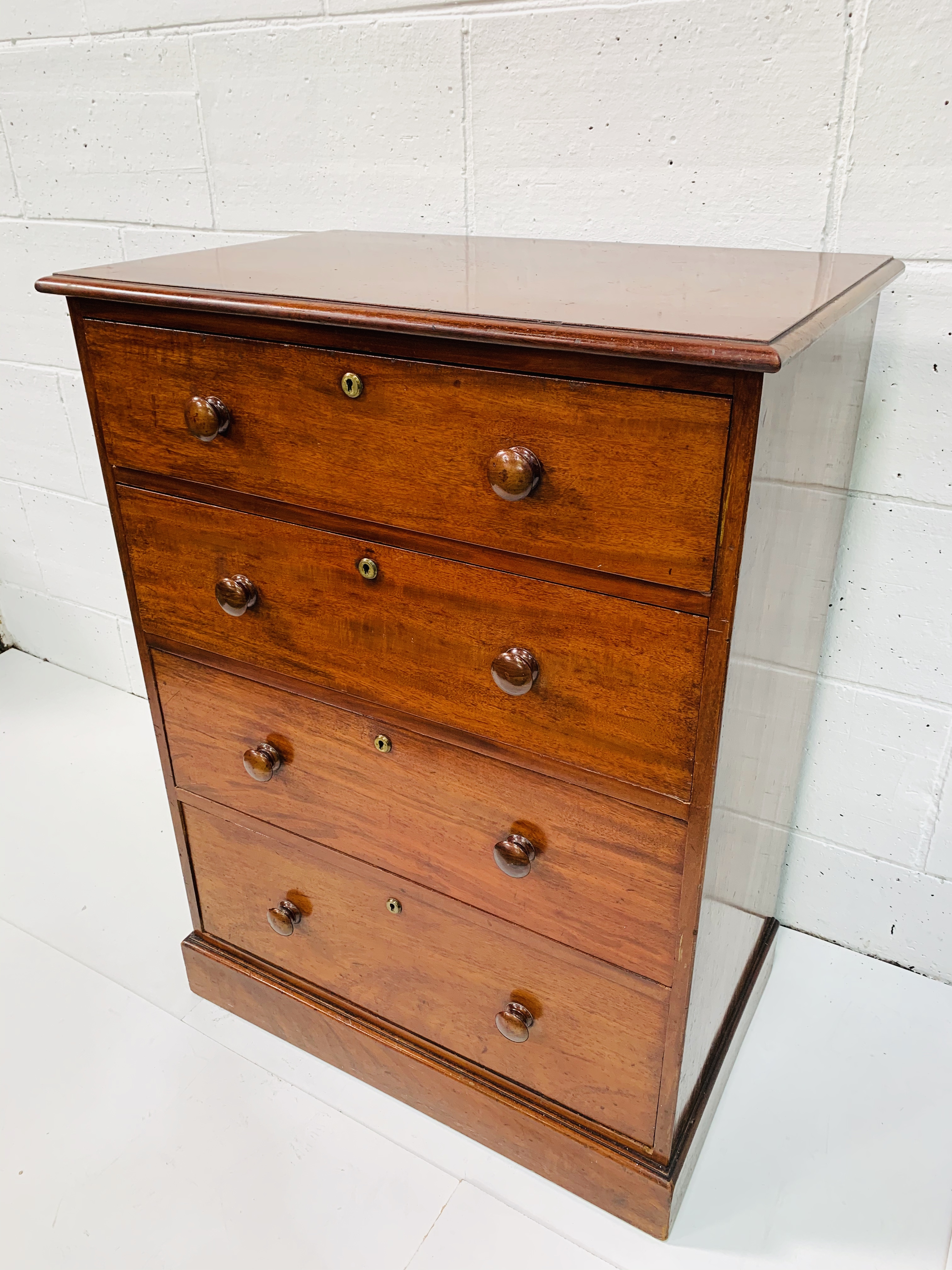 Mahogany chest of four graduated drawers by Spillman and Co. - Image 3 of 8