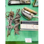 Salters gas iron; seven cut throat razors and a pair of strap on ice skates.