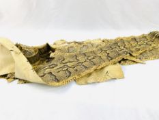 Three antique taxidermy python snake skins.