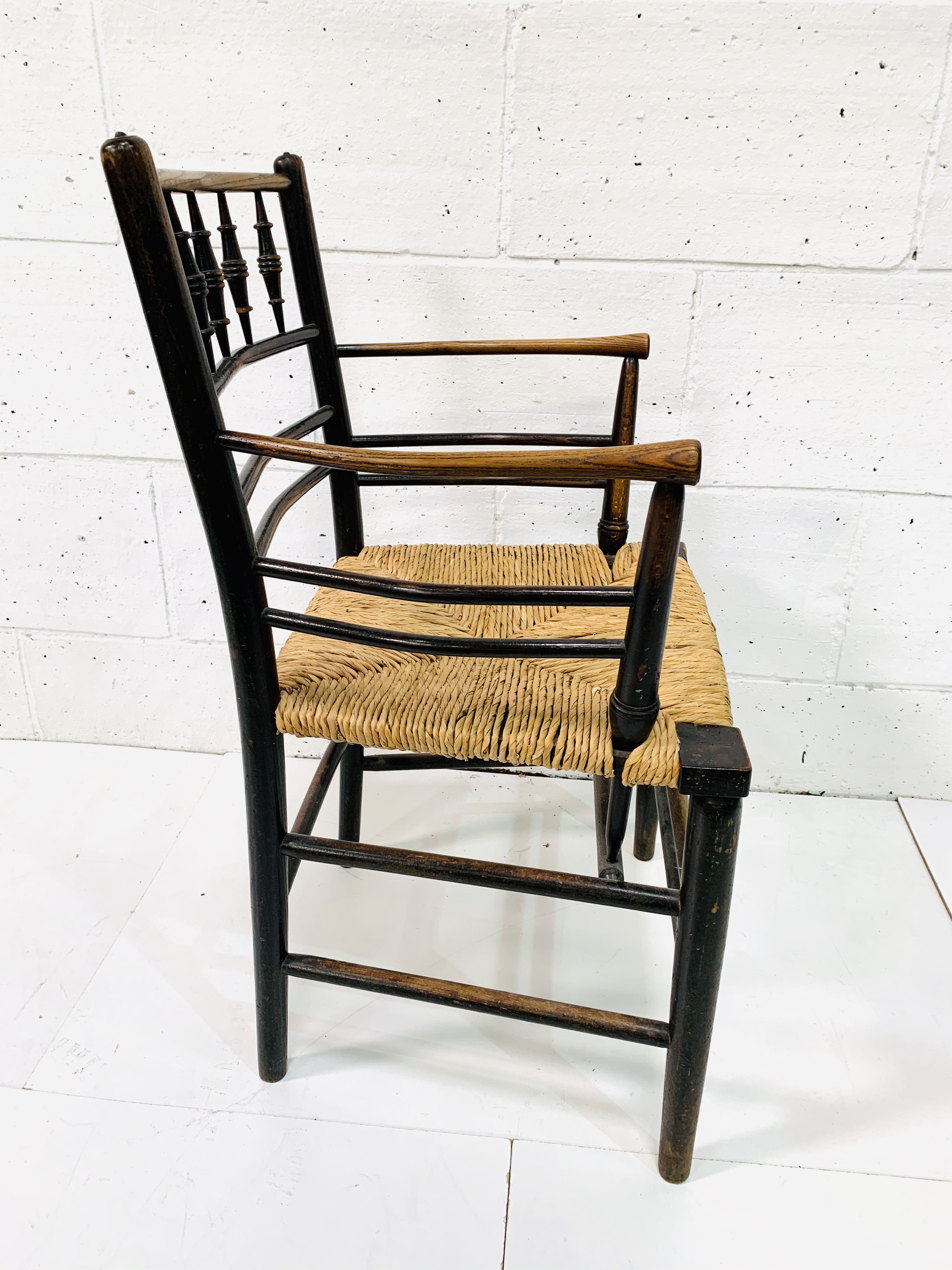 A late Victorian Morris & Co. ‘Sussex’ chair oak framed rail back open arm chair. - Image 4 of 5