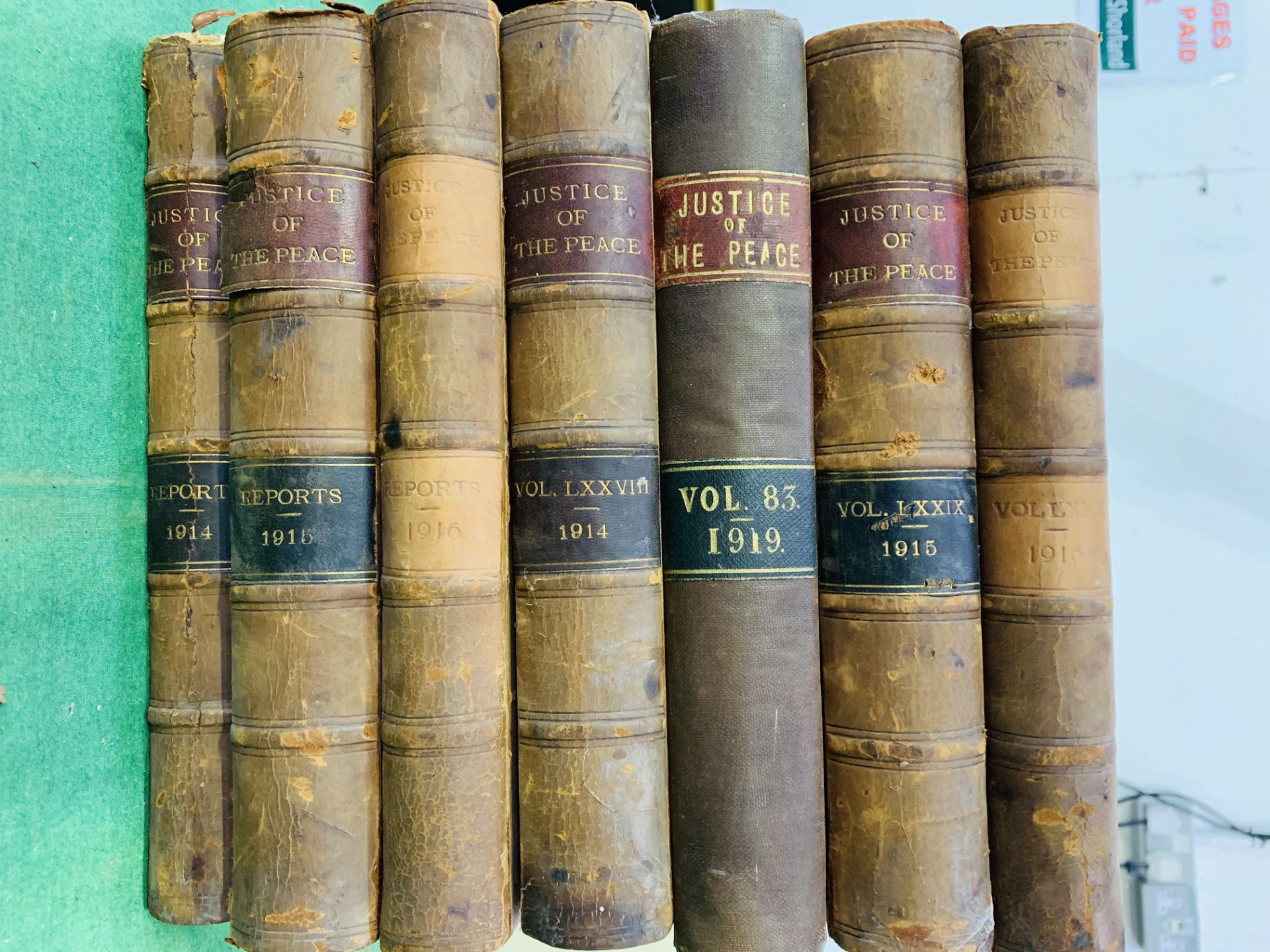 Seven leather bound volumes of Justice of the Peace Reports, 1914 to 1916 & 1919