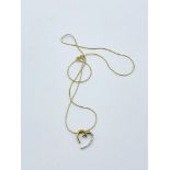 Yellow gold diamond set heart necklace 3.10g