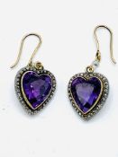 Edwardian amethyst and diamond heart-shaped earrings. Wt 9.5g. Length of amethyst 14.8mm.