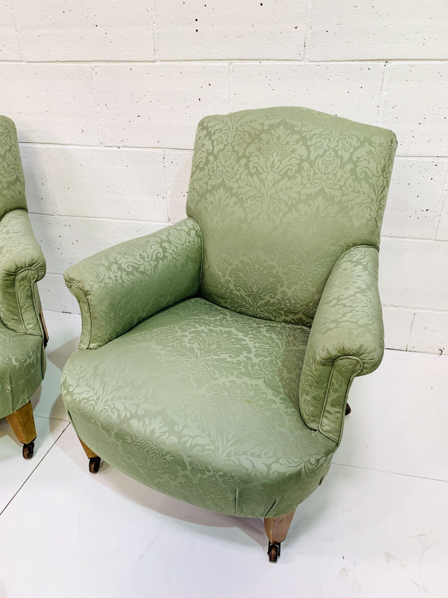 Pair of green upholstered arm chairs on ceramic casters. - Image 3 of 4