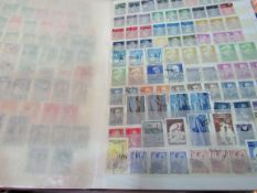 World stamps on pages and 2 stock books, 1000's of stamps.