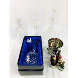 Cut glass decanter, silver plated ice bucket with five alcohol minatures; and 3 other decanters.