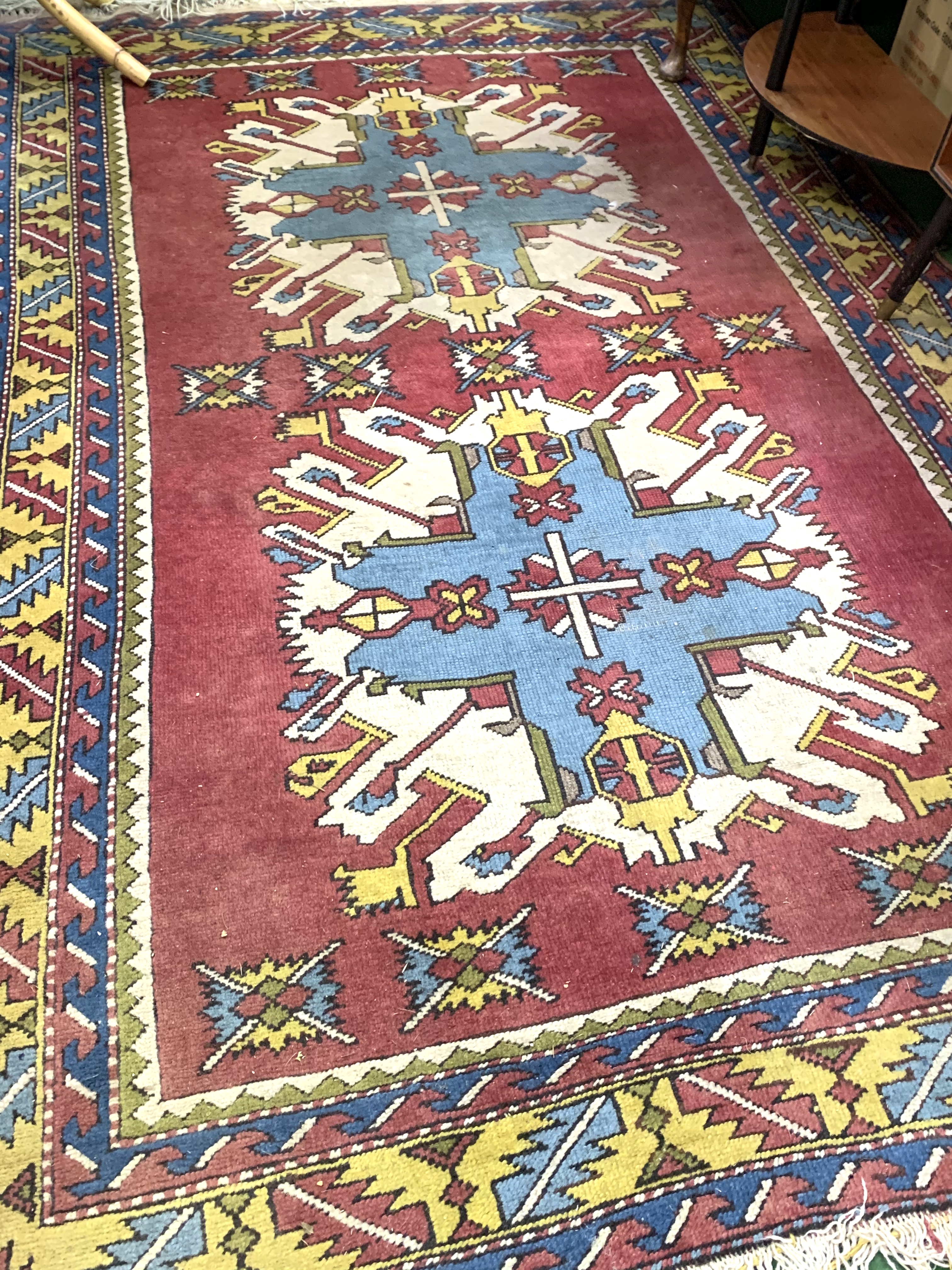 Red ground hand knotted Middle Eastern rug. - Image 2 of 2