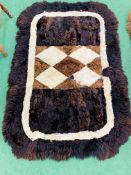 2 Alpacca fleece rugs, 140 x 100cms and 140 x 55cms.