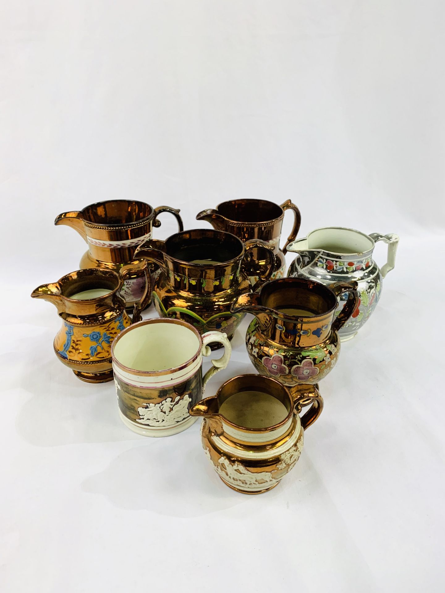 Seven lustre ware jugs and a lustre ware tankard. - Image 3 of 3