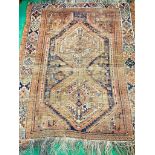 Brown ground hand knotted Middle Eastern rug.