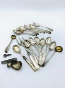 Qty silver teaspoons, small silver ladle, and other silver items