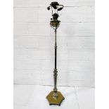 Decorative silver plate on brass floor standing oil lamp, converted to electricity