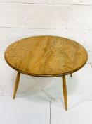Ercol style circular coffee table, 79 x 43cms.