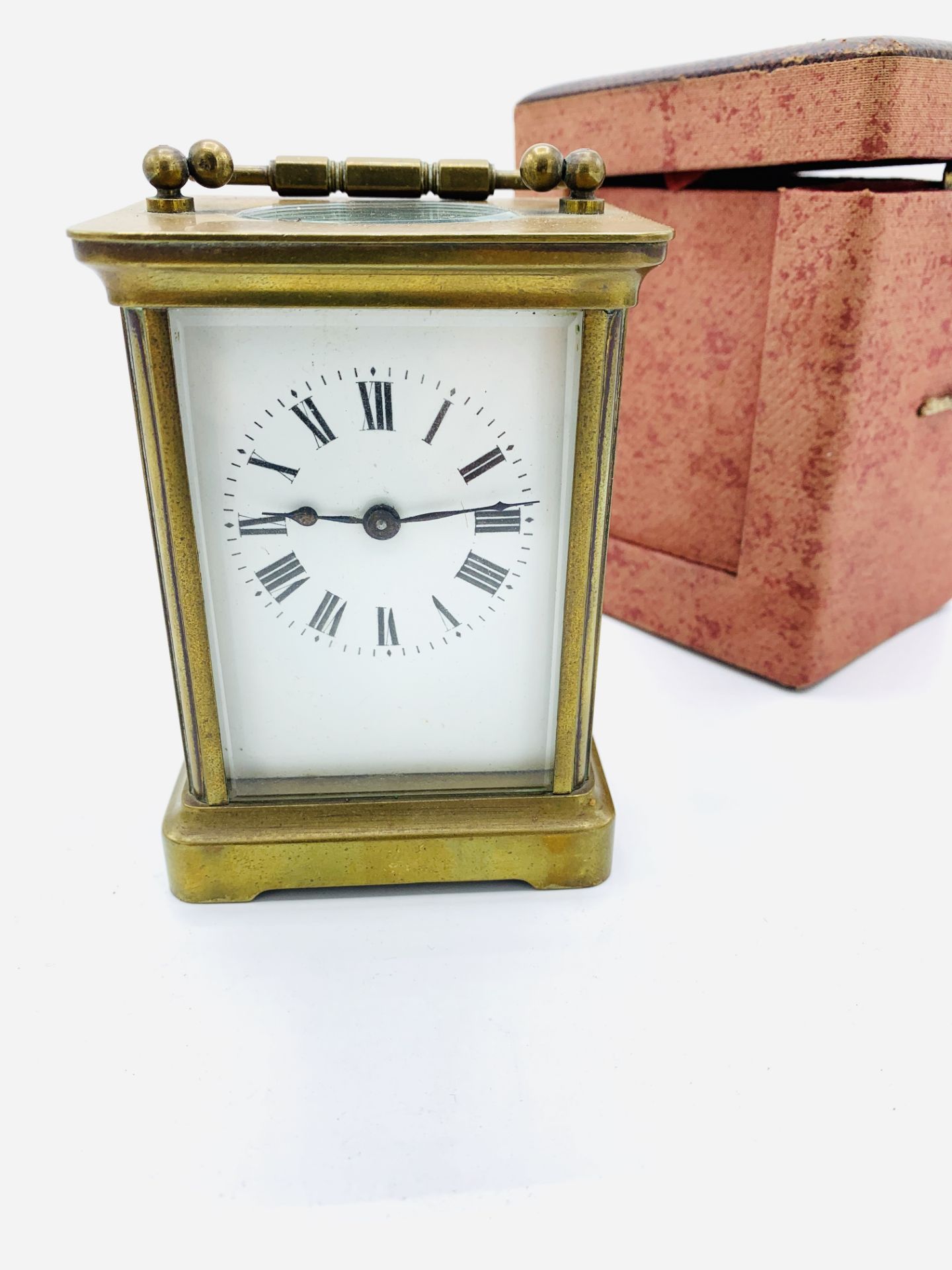 Brass case carriage clock marked ACCL, with original case, and key, going