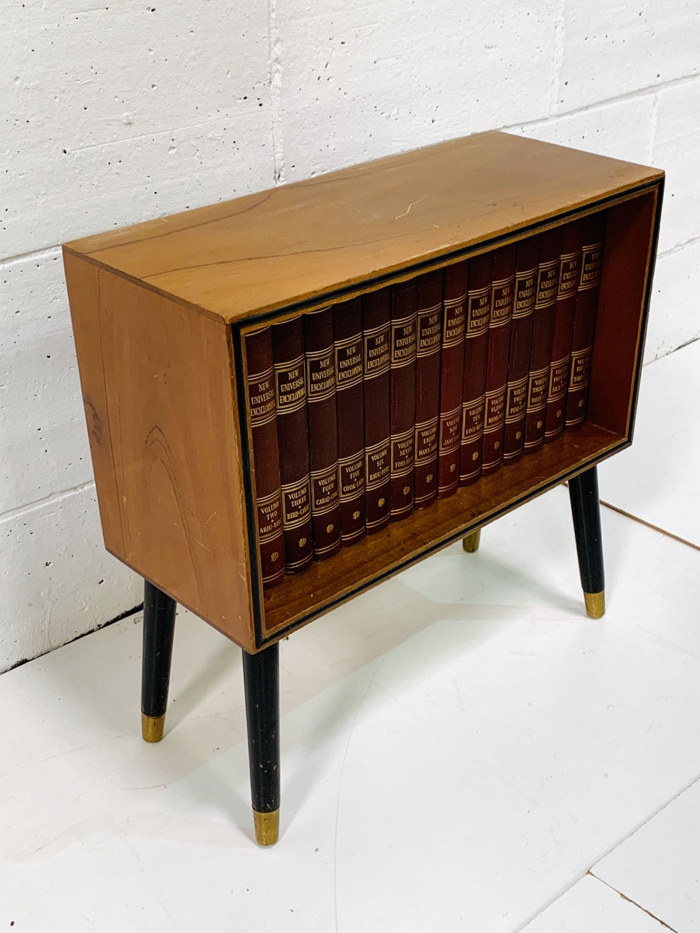 Teak small 1950's bookcase on legs with a complete set of the New Universal Encyclopedia. - Image 2 of 3