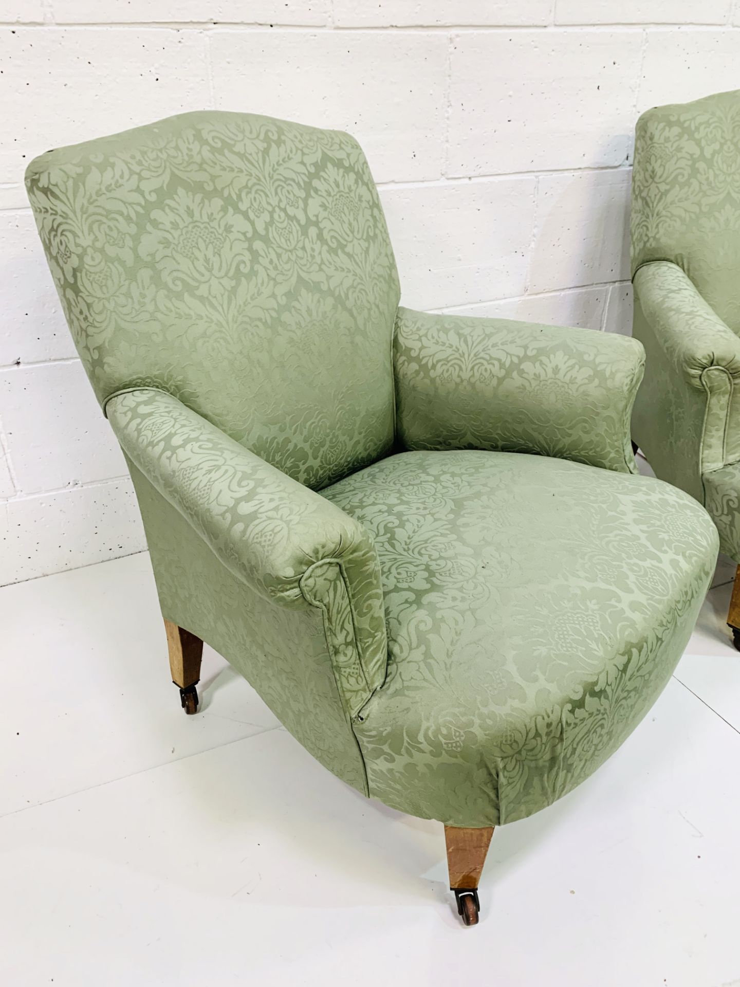 Pair of green upholstered arm chairs on ceramic casters. - Image 2 of 4