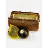 Leather case containing four rosewood bowls