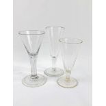 Three late 18th century/early 19th century dwarf ale glasses with ball knop.