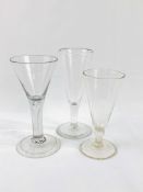 Three late 18th century/early 19th century dwarf ale glasses with ball knop.