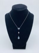 Platinum diamond aquamarine necklace. Length 26cm. Total Wt. 5.4gm.