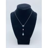 Platinum diamond aquamarine necklace. Length 26cm. Total Wt. 5.4gm.