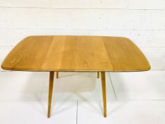 1950's Ercol drop side dining table.