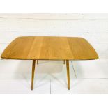 1950's Ercol drop side dining table.